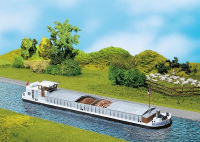 River cargo boat with dwelling cabin