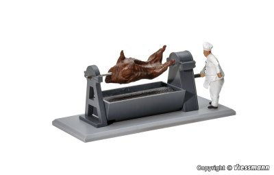 Zoom bild av Grill with rotating bullock and glowing embers