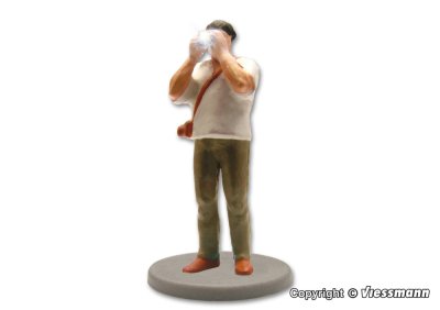 Zoom bild av 1519 H0 Fotograf med utrustning och blixtljus