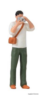 Zoom bild av 1519 H0 Fotograf med utrustning och blixtljus